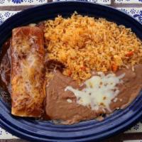 Lunch Enchilada · A traditional enchilada with your choice of juicy shredded chicken, fresh ground beef, or me...