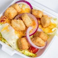House Salad  · Lettuce, tomato, cheddar cheese, onion, croutons, dressing.