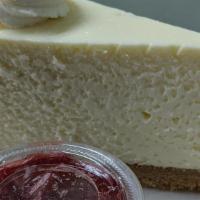 Ny W/Strawberry Topping · Our NY cheesecake served with 2 oz. of our homemade strawberry topping. LIMIT 3 PER ORDER