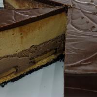Peanut Butter Cup · A layer of chocolate and peanut butter cheesecakes baked on an Oreo and Nutter Butter crust ...