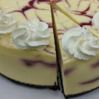 White Chocolate Raspberry · Our NY cheesecake flavored with Ghirardelli white chocolate with ripples of raspberry throug...