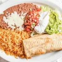 Chimichanga · Fried flour tortilla stuffed with meat. Served with rice or beans, lettuce, pico de gallo, g...