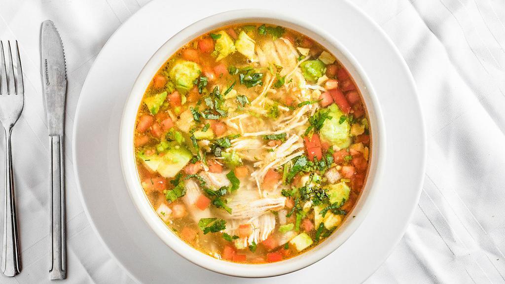 Sopa De Pollo · Special house soup with shredded chicken, mexican rice, pico de gallo, and fresh avocados