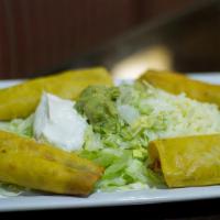 Mexican Flautas · Four (4) fried rolled taquitos with shredded chicken or ground beef. Served with lettuce, so...
