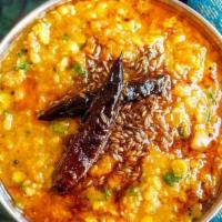 Dal Tadka · Lentils sautéed with ginger, onion, garlic, and tomato.
