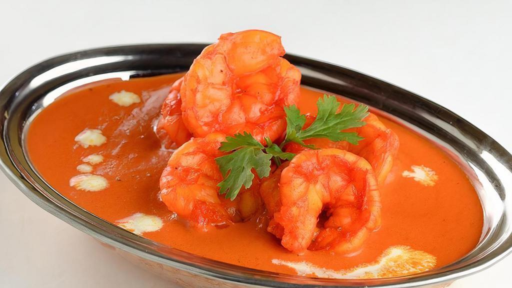 Shrimp Maharaja · Jumbo shrimp marinated in yogurt and cooked with tomato and mild cream sauce.