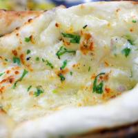Cheese Naan · This naan can be stuffed with soft-melted cheese which is crispy from outside and soft from ...
