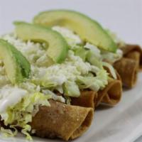 Flautas · Four crispy, rolled- up corn taquitos stuffed with shredded chicken, topped with refried pin...