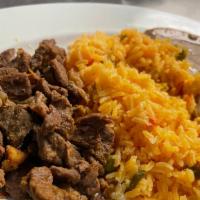 Rice And Beans With Meat · Mexican rice served with refried pinto beans and your choice of meat. (Chicken, Steak, Groun...