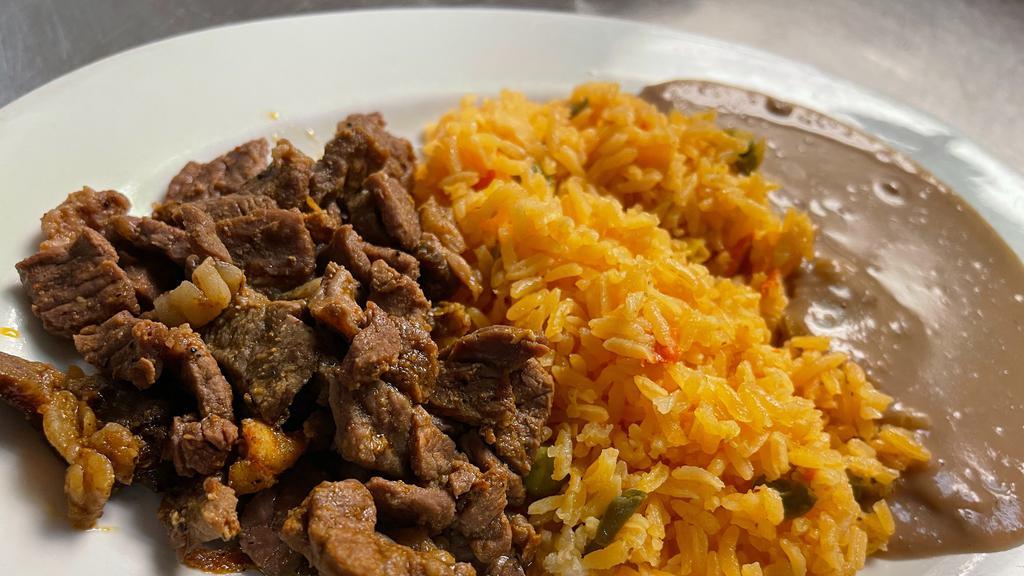Rice And Beans With Meat · Mexican rice served with refried pinto beans and your choice of meat. (Chicken, Steak, Ground Beef, Carnitas).