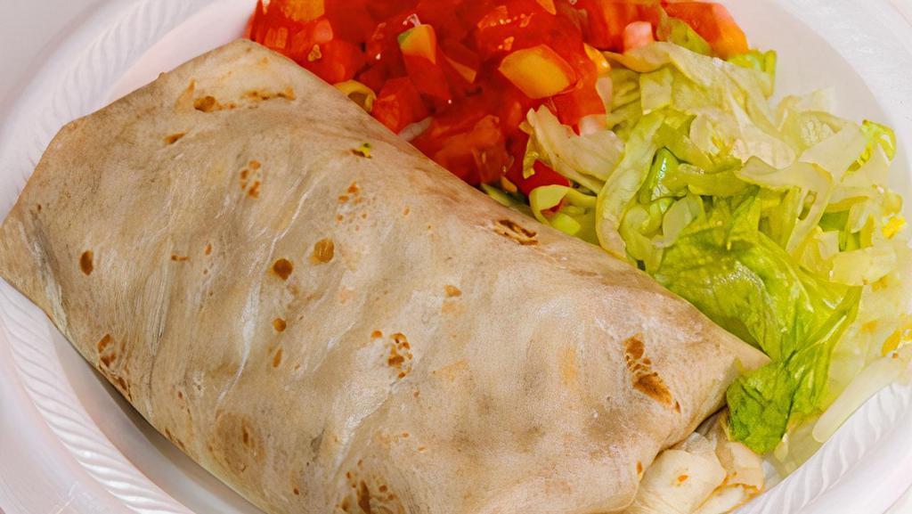 Mini Burrito · Flour tortilla stuffed with rice, beans, cheese and your choice of steak, chicken or ground beef. Served with a side of your choice.