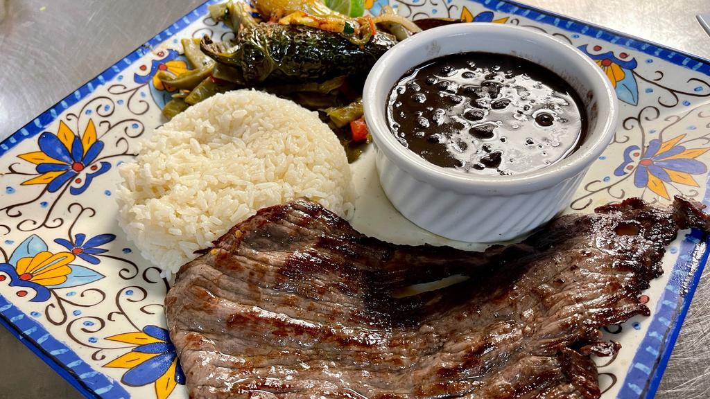 Cecina Mexicana · Salted grill steak served with white rice, black beans,
nopales, pico de gallo and tortillas