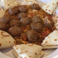 Kofta Moroccan Meatballs · Angus ground beef blended with finely chopped onions, cilantro, and Moroccan seasoning. Roll...