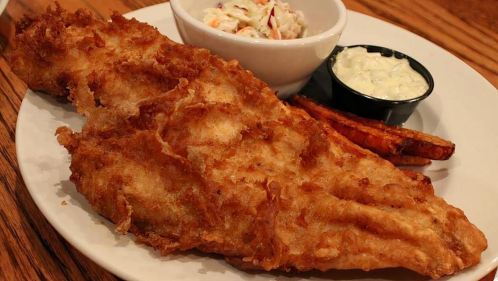 Fish And Chips · Beer battered Atlantic white fish served with fries, coleslaw, and creamy tartar sauce.