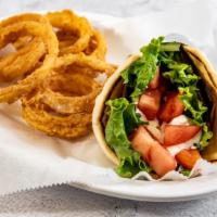 Gyro Sandwich · Grilled chicken or lamb in a toasted pita with lettuce, tomatoes, and tzatziki sauce. Served...