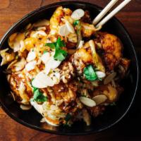 General Tso'S Cauliflower · Crispy cauliflower, alomds, Asian slaw, Kokuho rice