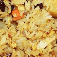 Hawaiian Fried Rice · Pineapple, cashew, yellow curry, raisin, garlic, onion, egg. peas, scallion and carrot.