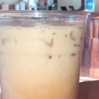 Somali Chai · Our classic chai made with black milk tea, cardamom, cinnamon, and cloves.