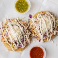 Sopes · Three homemaDe thick tortillas topped with choice of carnitas, grilled chicken, al pastor, s...