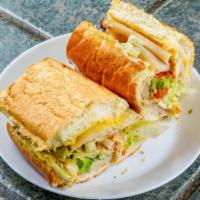 Turk · Turkey, mayonnaise, mustard, provolone, onions, bell peppers, Italian spices, lemon herb dre...