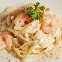 Shrimp Alfredo · Combination of grilled shrimp and homemade Alfredo sauce over fettuccine noodles.