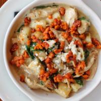 Gnocchi · Hand-rolled potato gnocchi, roasted chicken, gorgonzola cream, spinach, spiced walnuts