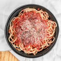Spaghetti · Traditional marinara sauce with garlic and herbs served over spaghetti noodles.