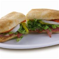 Italian Sub · The Italian sub is served with salami, ham, capicola ham, provolone, lettuce, tomatoes, swee...