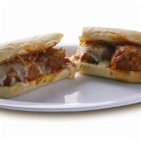 Meatball Sub · The meatball sub is served with meatballs, Parmesan, provolone.
