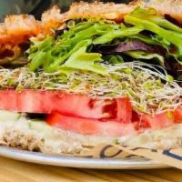 Vegan Sandwich · Romesco, Sprouts, Tomato, Cucumbers, Lettuces, Tahini, on Toasted Sandwich Sour