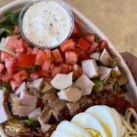 Chopped Salad · Chopped Salad . Romaine Lettuce, Bacon, Chicken, Hard Boiled Eggs, Tomatoes, White Cheddar, ...