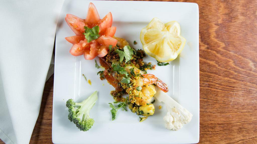 Hariyali Shrimp · Jumbo prawns, herbs and spices, asparagus-chard satan, coconut sauce.