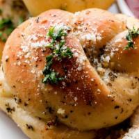 Garlic Knots · Our special bread spiced with garlic and seasonings.