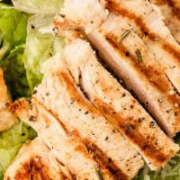 Grilled Chicken Caesar Salad · Grilled chicken over romaine lettuce, tossed with Caesar dressing, croutons and parmesan che...