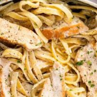 Fettuccine Alfredo Chicken · Grilled chicken with creamy Alfredo sauce, topped with parmesan cheese. Served with  hot gar...
