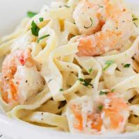 Fettuccine Alfredo Shrimp · Grilled shrimp with creamy Alfredo sauce, topped with parmesan cheese. Served with  hot garl...