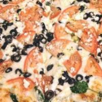 Greek Pizza · Olive oil, garlic, oregano, feta cheese, onions, black olives and tomatoes.