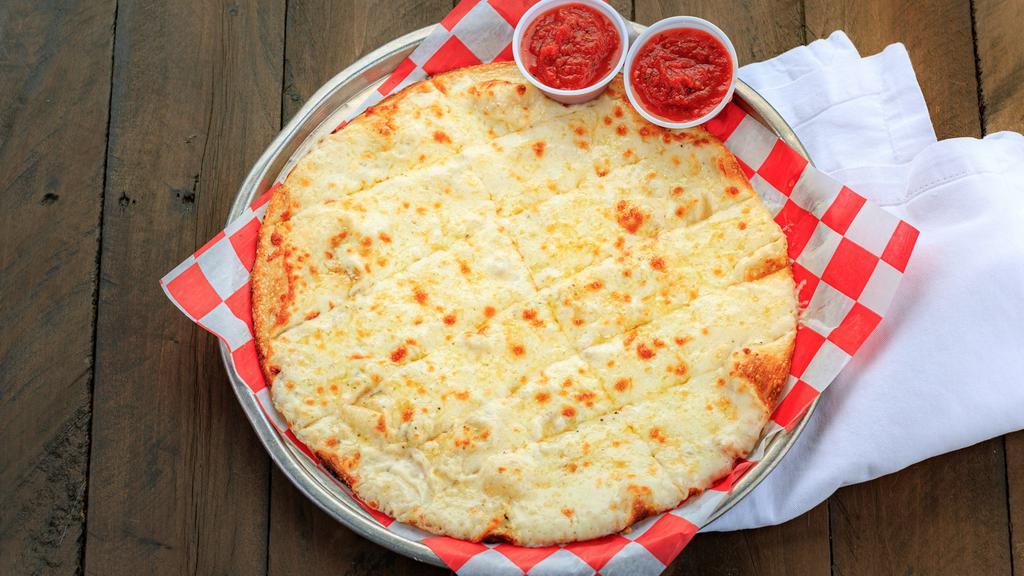 Cheese Bread (Garlic) · Rising crust covered with garlic herb butter, cheese, garlic, and basil served with a side of house red sauce