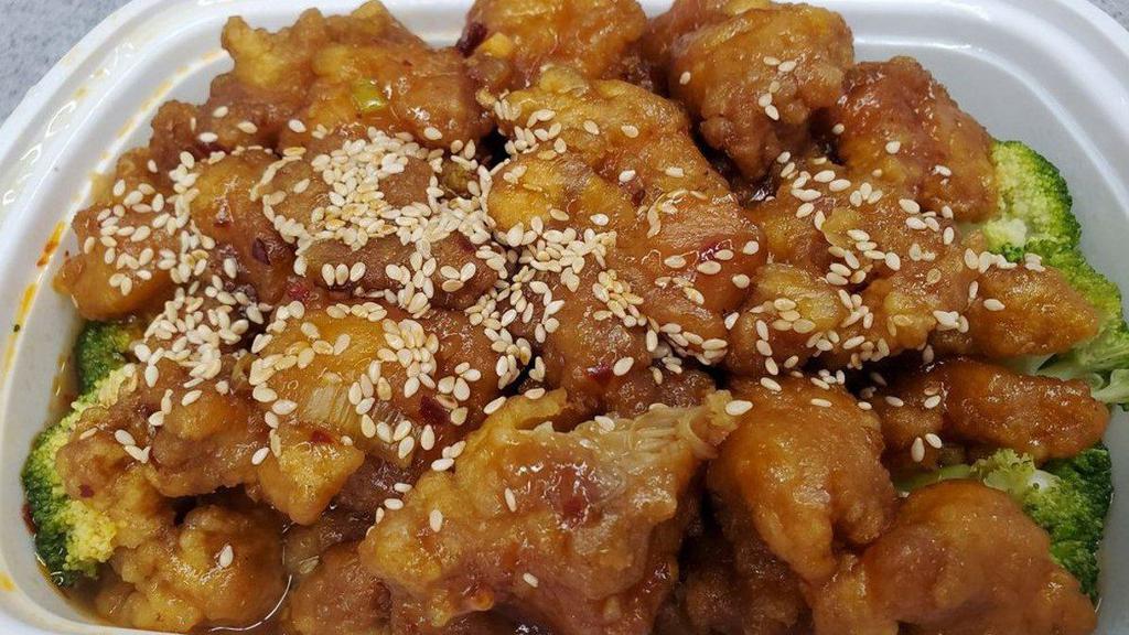 Sesame Chicken · Hot & spicy. Chunks of chicken stir-fried with our chef's sesame seed and hot garlic sauce.