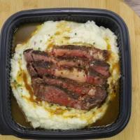 Meat And Potatoes · 7 oz. of tender ribeye steak with creamy mashed potatoes, an
extra side, and drink..