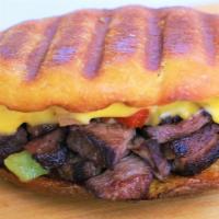 Pepper Steak And Cheddar Meal · Tender ribeye strips with, green peppers and onions,
on toasty brioche bread, with two sides...