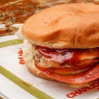 #10 Regular Chicken Sandwich · Charcoal broiled chicken breast, lettuce, tomatoes, pickles, mayonnaise, and basted with our...