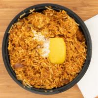 Biryani · Aromatic Indian basmati rice cooked with fresh herbs, spices, nuts and raisins.