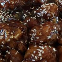Sesame Chicken · Chunks of chicken cooked in a specially prepared sauce with fragrant sesame seeds.