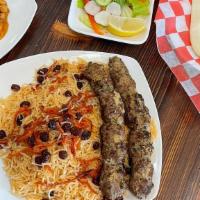 Afghan Beef Shami Kabab · Ground beef in an aromatic marinade of citrus, onion, and traditional Afghani seasoning, ske...