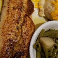Stuffed Catfish · Catfish fillet stuffed with shrimp and crab stuffing. Served with garlic mashed potatoes.