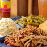 Combo Plate · Includes beef brisket, pulled pork and baby back ribs.