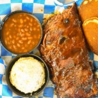 Rack Of Ribs (½) · Meaty, fall off the bone St Louis cut ribs. Slow smoked then sauced for ultimate flavor.