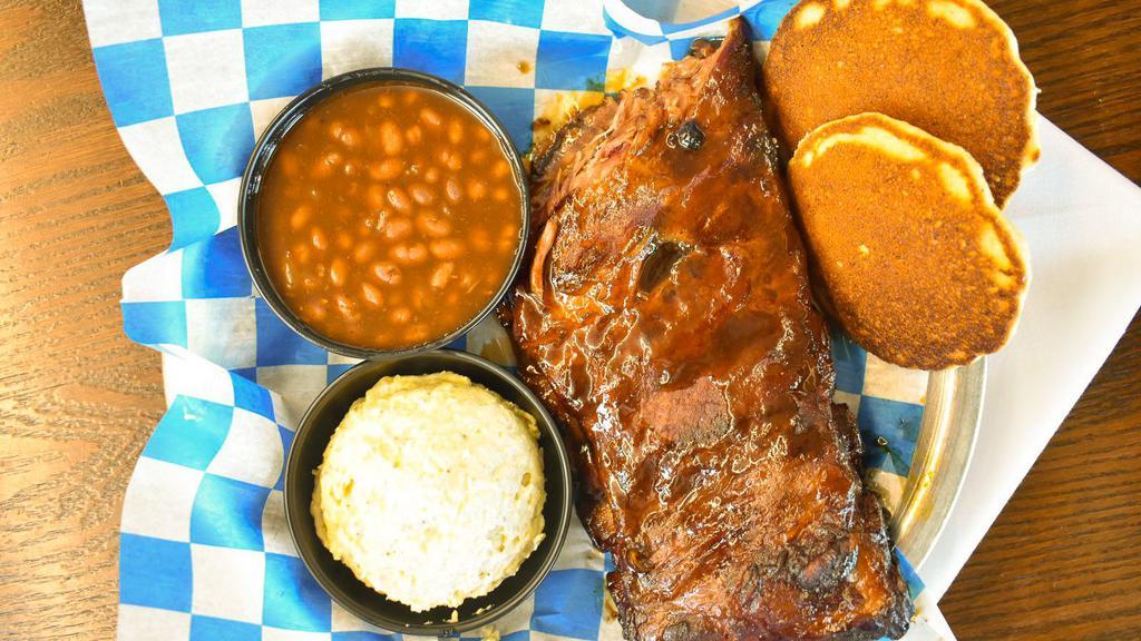 Rack Of Ribs (½) · Meaty, fall off the bone St Louis cut ribs. Slow smoked then sauced for ultimate flavor.