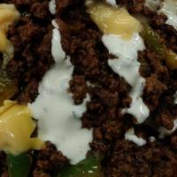 Loaded Taco Fire Fries · seasoned Idaho fries topped with 100% beef with authentic mexican spices and herbs perfectly...